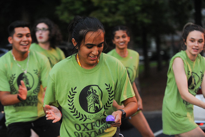 Students in green t-shirts compete in the Oxford Olympics