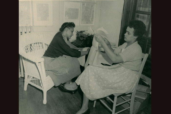 Sarah Wright (right) working with an unidentified woman, circa 1960s. Credit: Sarah Wright papers, MARBL, Emory University.