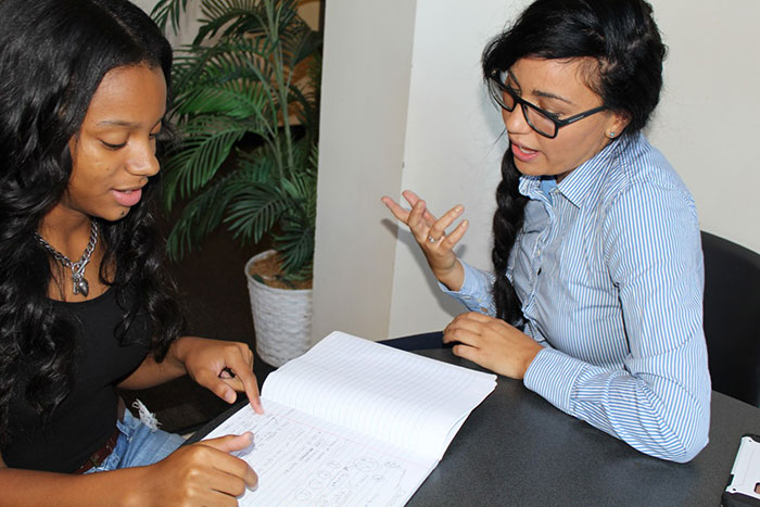 With student: Alexa Dantzler (right) meets with Victoria Lamar, a high school student participating in SOAR.