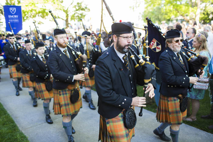Bag-pipers lead the procession