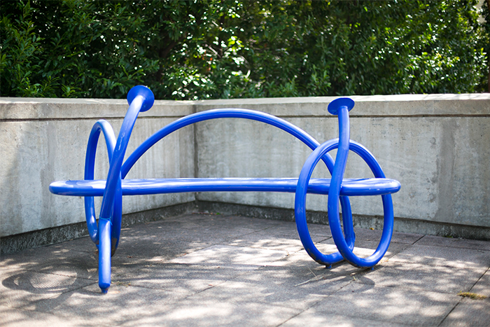 "Whisper Chair" is set on Tull Plaza in front of the Anthropology building. North Carolina sculptor Jim Galluci created the bright blue powder-coated steel bench intertwined with a hollow tube. 