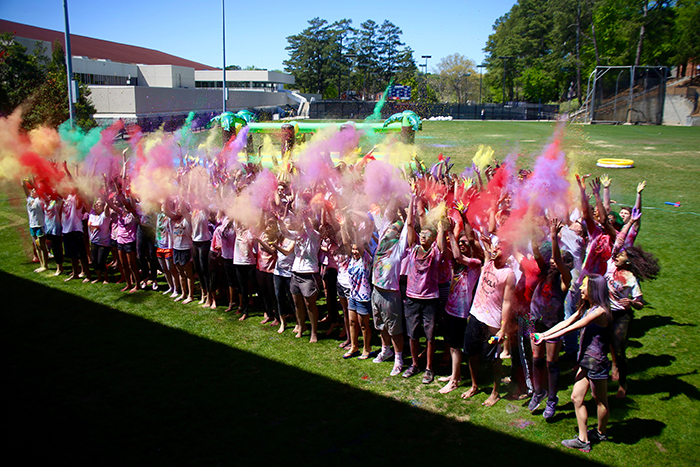 group releasing colored powder