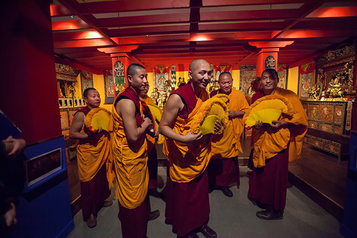 monks standing  in shrine