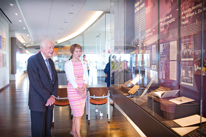 jimmy carter and rosemary mcgee look at displays