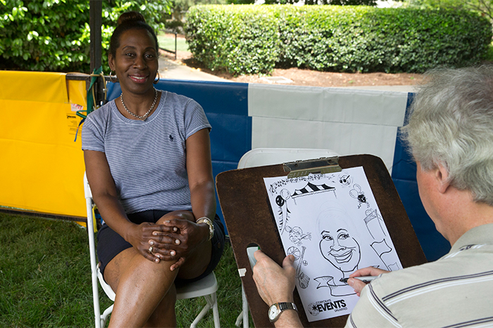 Caricatures were one of several fun activities offered on the Quad, along with music, food, games and information from Emory programs and divisions.
