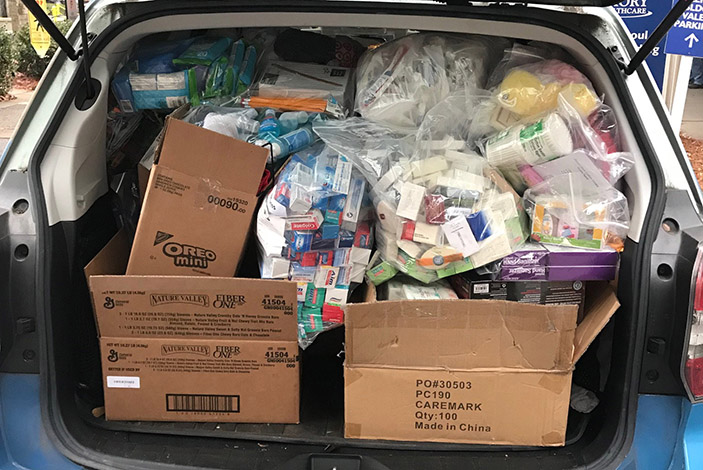 Emory University Hospital Midtown employees collected and donated hundreds of much-needed travel-sized toiletries and school supplies to the HEALing Community Center.
