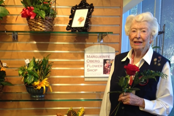 Emory Saint Joseph's Hospital names its flower shop after long-time volunteer, Marguerite Oberg. A ceremony to honor Oberg was held on Oct. 10, 2013.