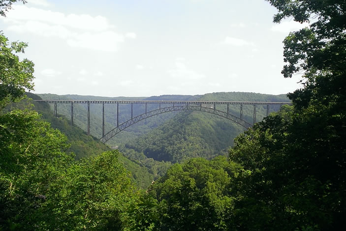 Our spacious house resides in the woods of West Virginia with a beautiful view of the New River Bridge down the street.