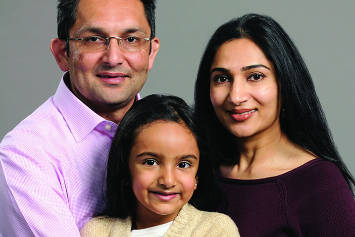 Sepsis survivor and heart transplant recipient Ketan Thanki (above with wife, Narten, and daughter, Ariha) volunteers as an adviser at Emory Healthcare.