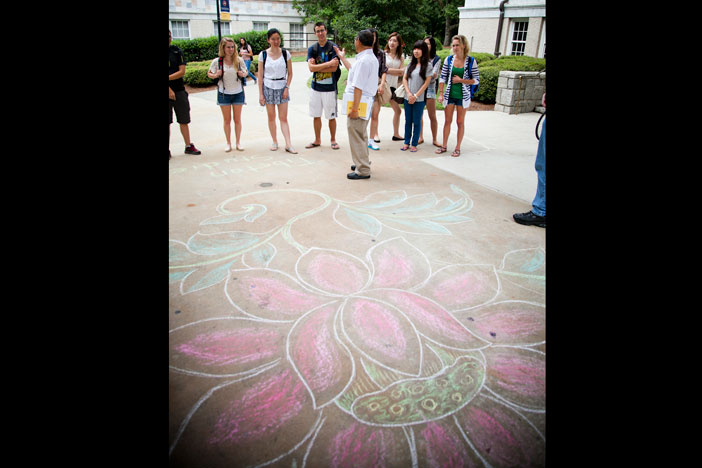 A second drawing of a lotus flower, placed near the Robert W. Woodruff Library, represents spiritual purity and divine origination.