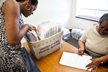 Emory College Admission staff Shahara Daniels (left) and Shawn Crawford prepare to mail acceptance letters.