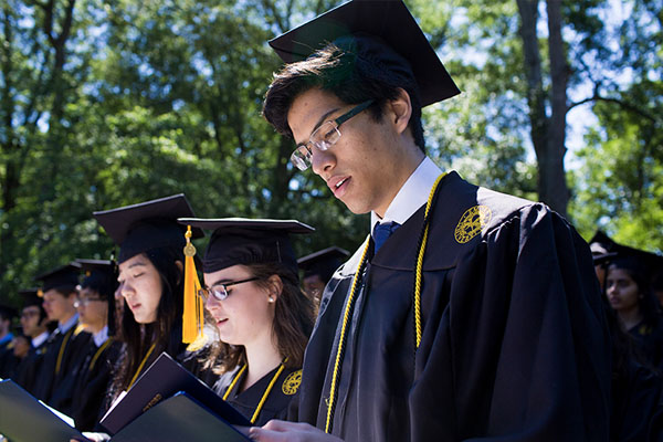 Oxford students take part in commencement ceremonies on the Oxford quad. 
