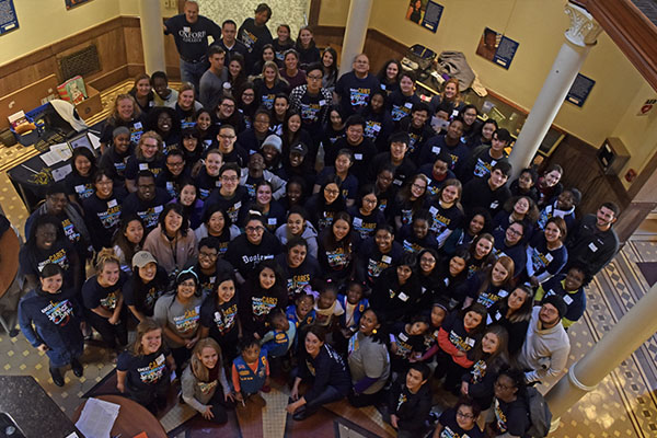 Students gather in the Oxford student center to pack boxes for Emory Cares.
