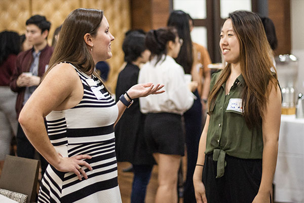 Oxford alumna Kinsey McMurtry talks with second-year student Jessica Park during a recent networking event.