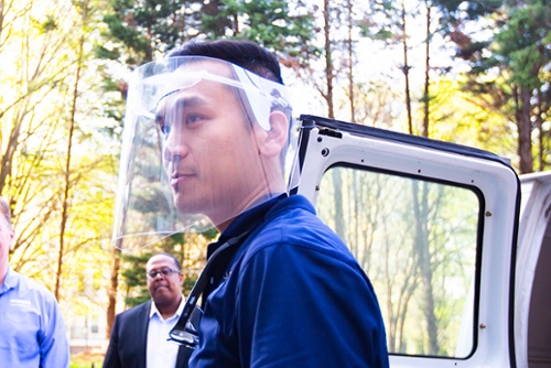 Man wearing a face shield