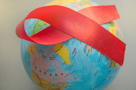 globe with red ribbon for AIDS awareness