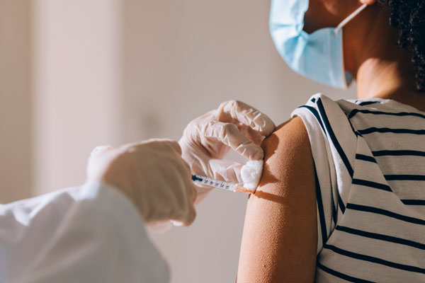 A person receives a vaccine