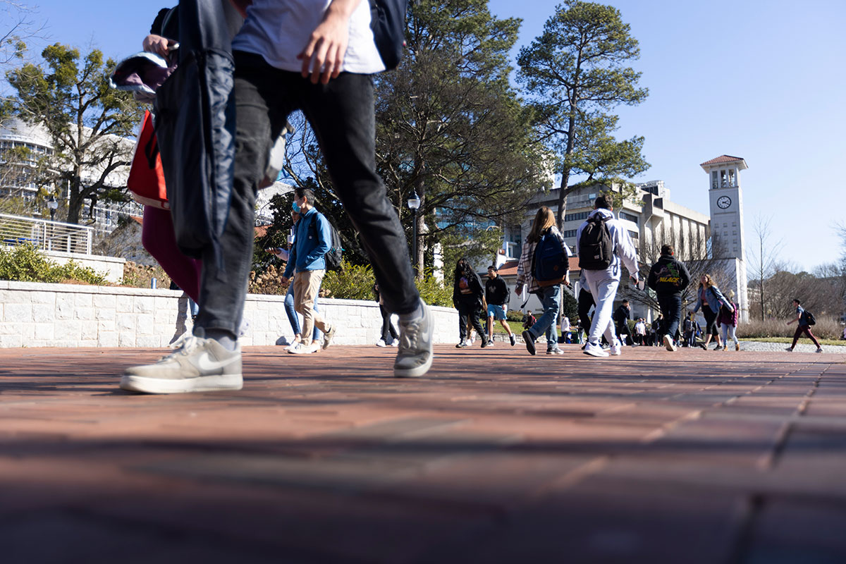 Students walk on Emory's campus