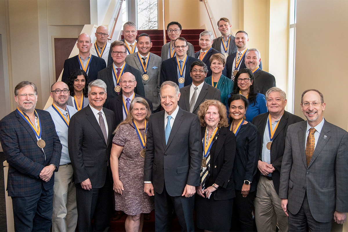 newly endowed faculty with Emory University leaders