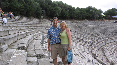 Warren and Kathy Brook in a large outdoor amphitheatre