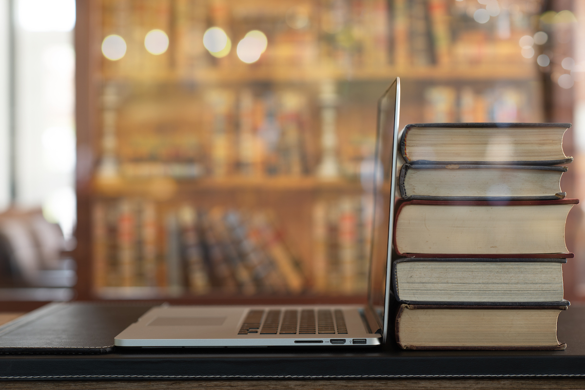 Books/laptop stock image