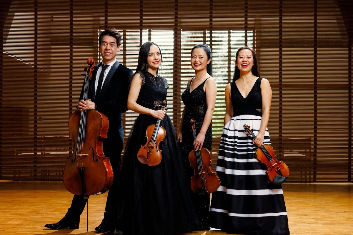 Photo: Four musicians with their string instruments