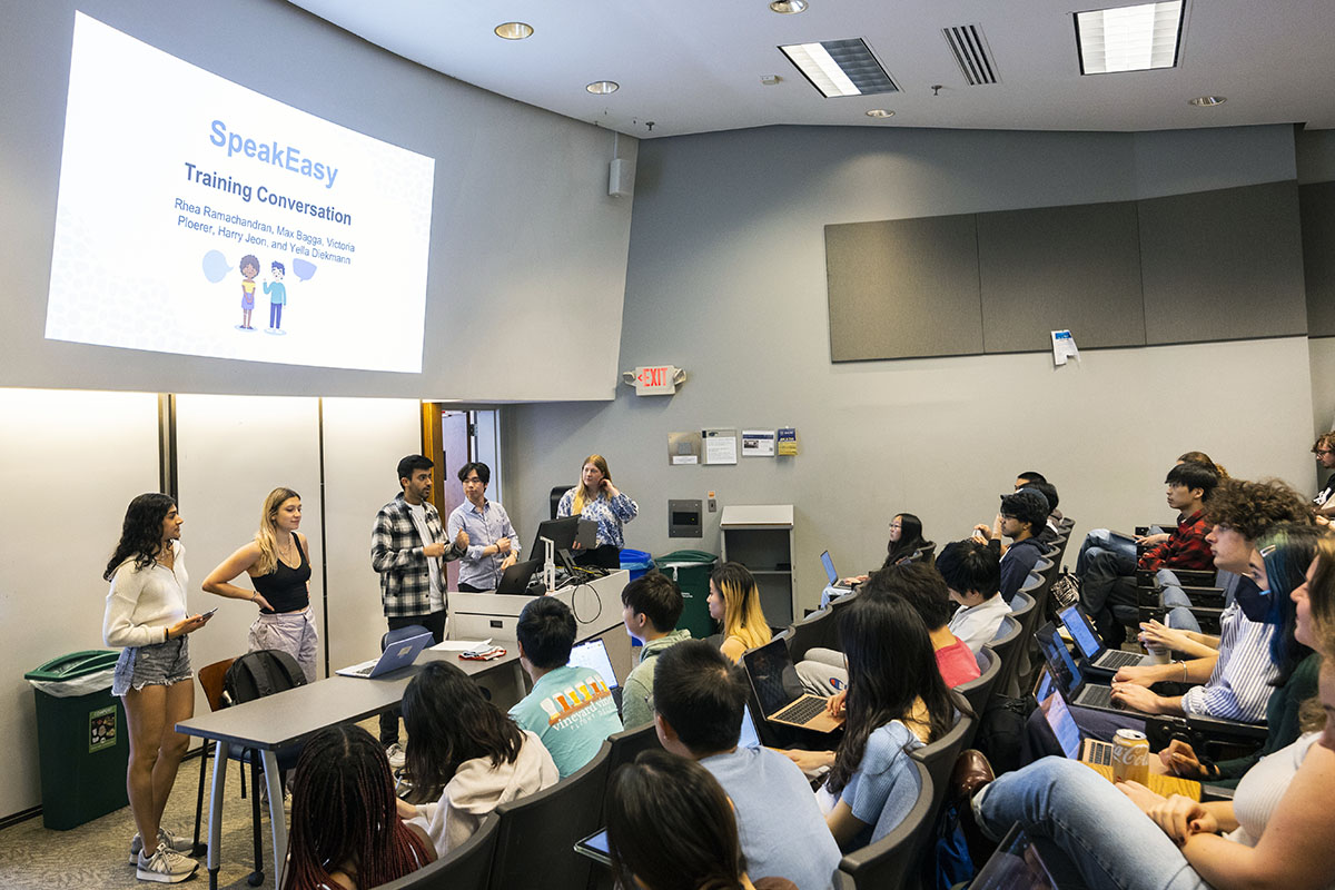 Students presenting in Computational Linguistics class