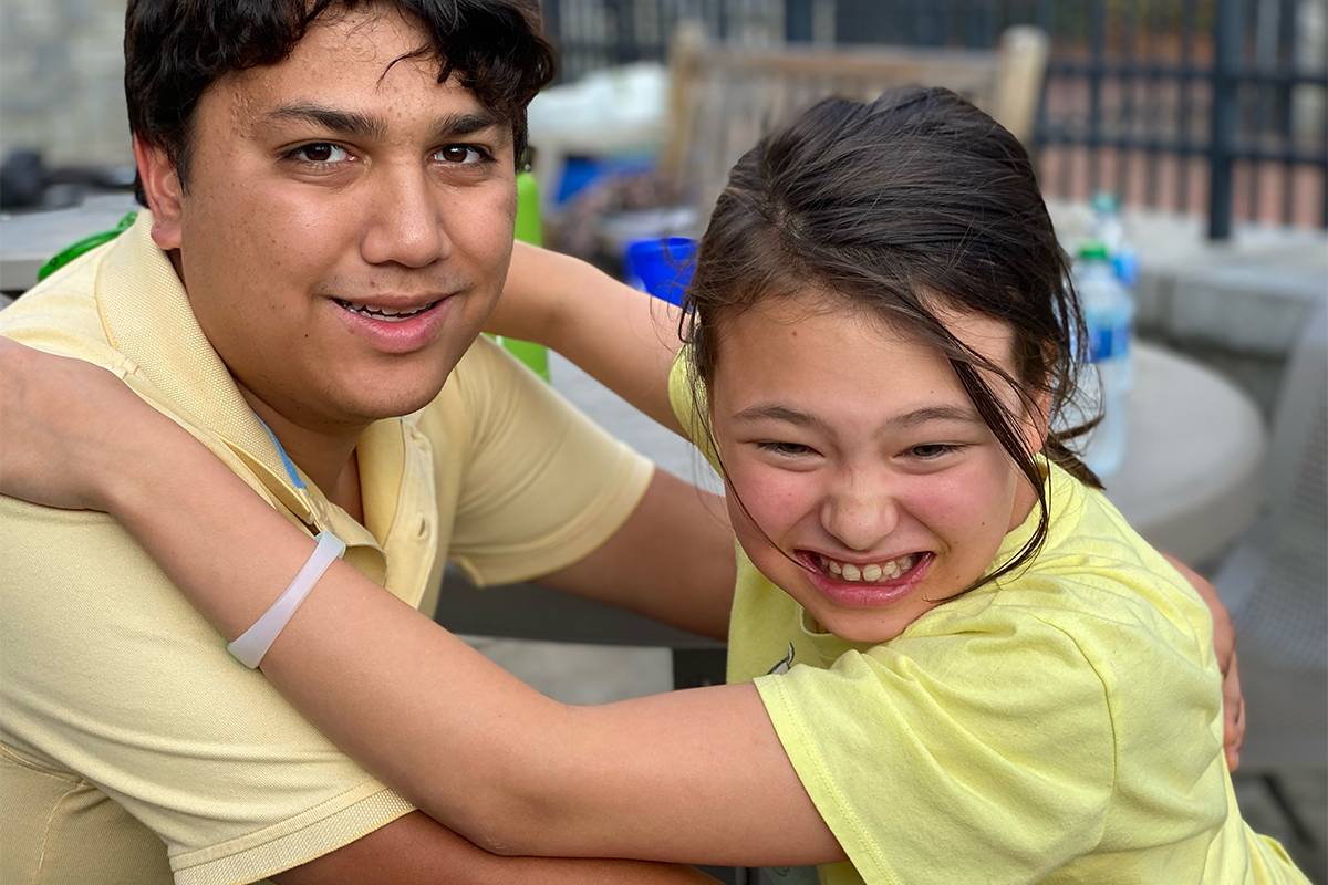 young female swimmer beside pool during Special Olympics Georgia