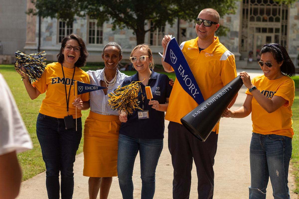 students with emory gear
