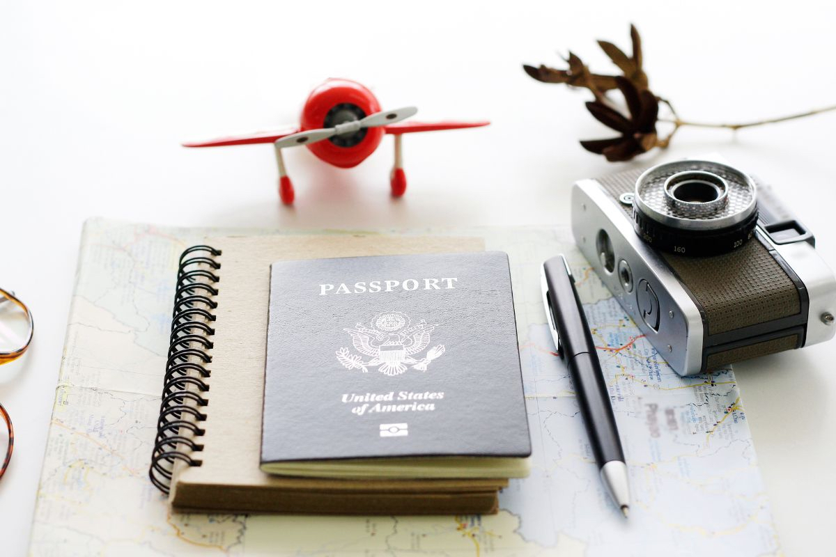 Passport and toy airplane 