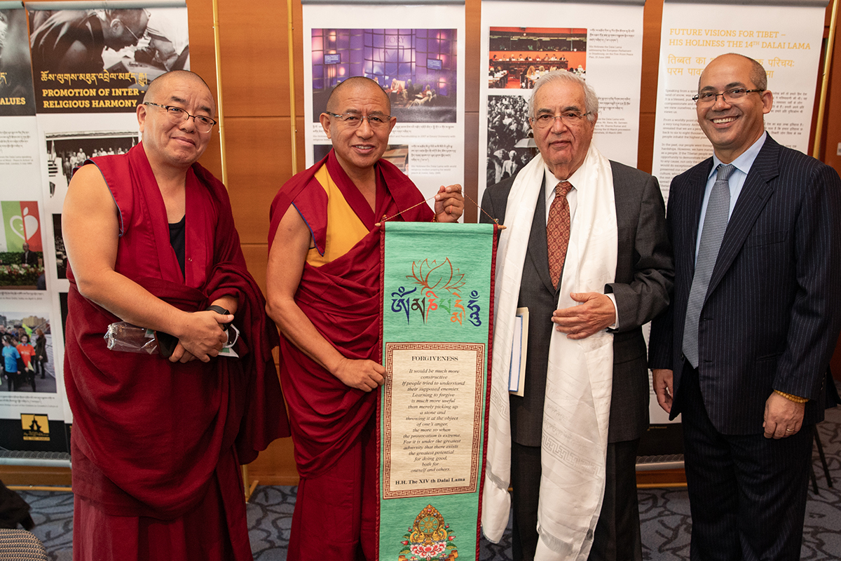 Dr. Negi and Dr. Bobby Paul, cofounders of the Emory Compassion Center, during the partnership renewal ceremony with two Tibetan Buddhist monks