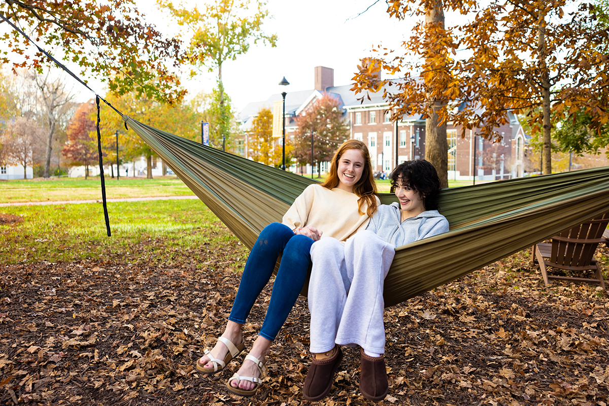 students on hammock outside