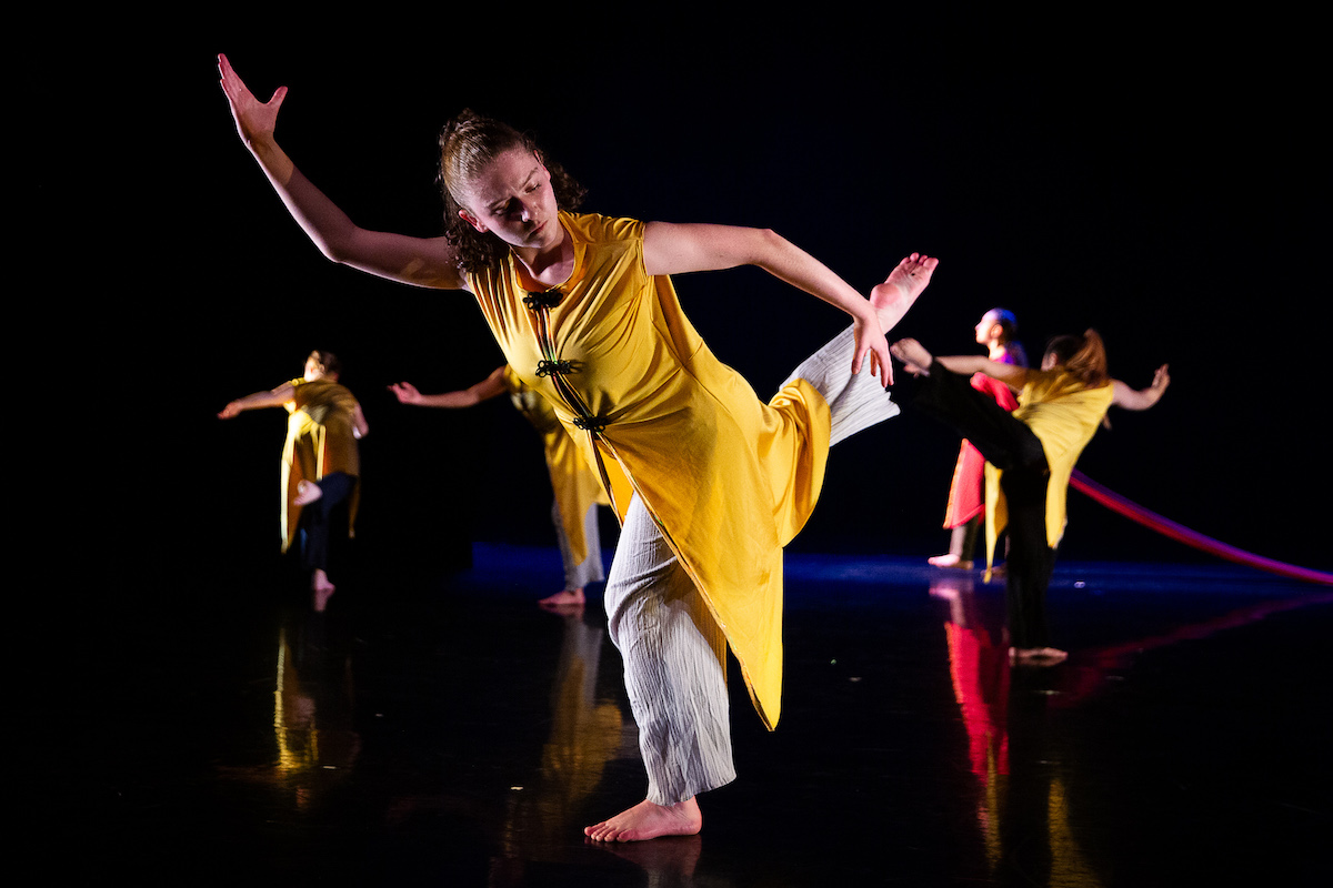 Emory dancers in movement on stage