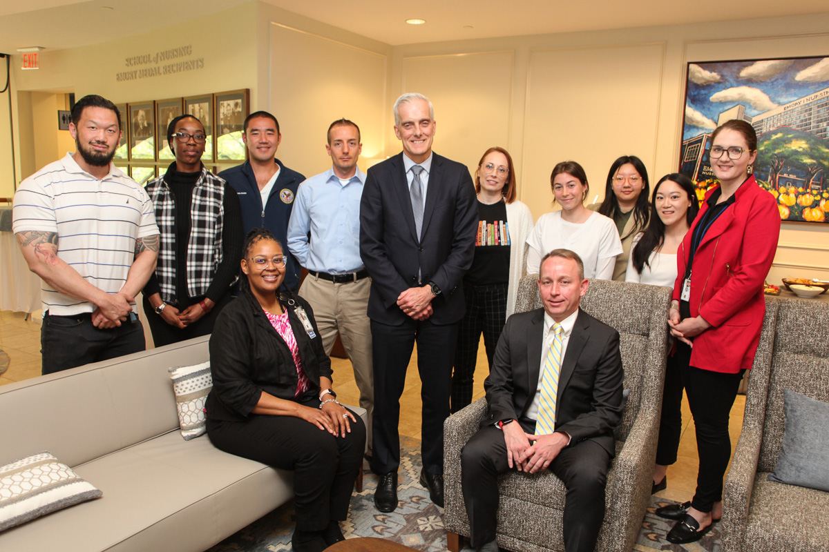 U.S. Secretary of Veterans Affairs Denis McDonough (center) with School of Nursing students after the roundtable discussion.
