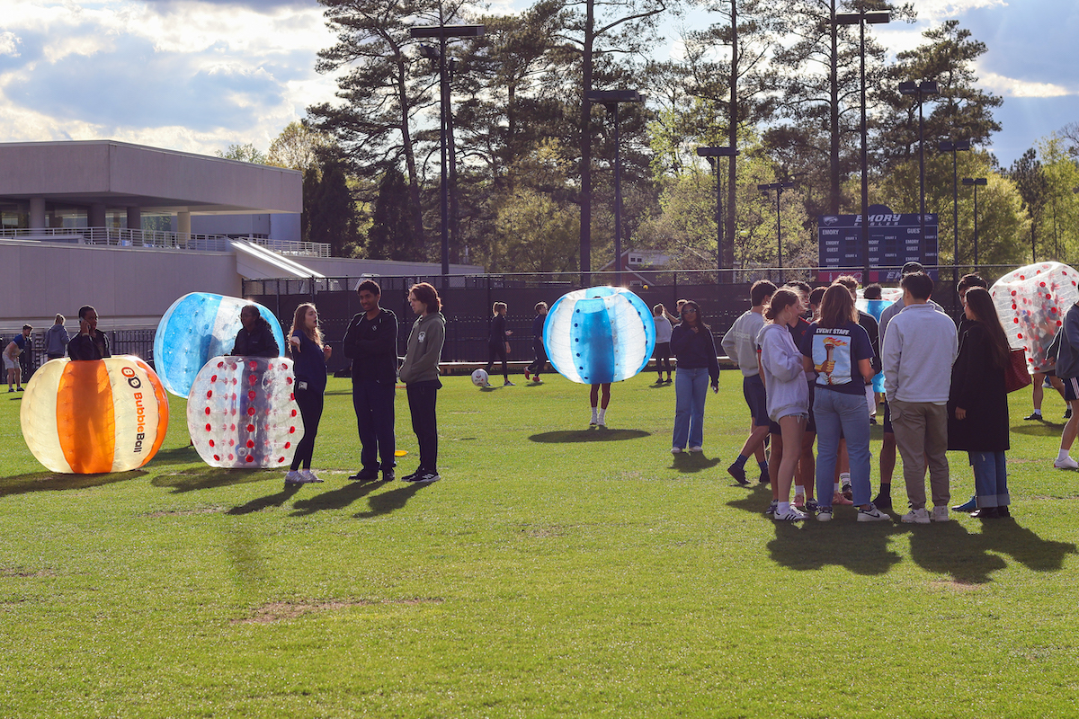 students playing bubble soccer