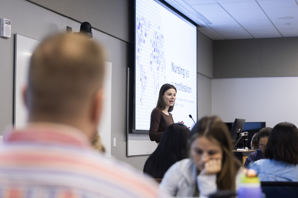 Photo of Chelsea Hagopian delivering a lecture to Emory School of Nursing students