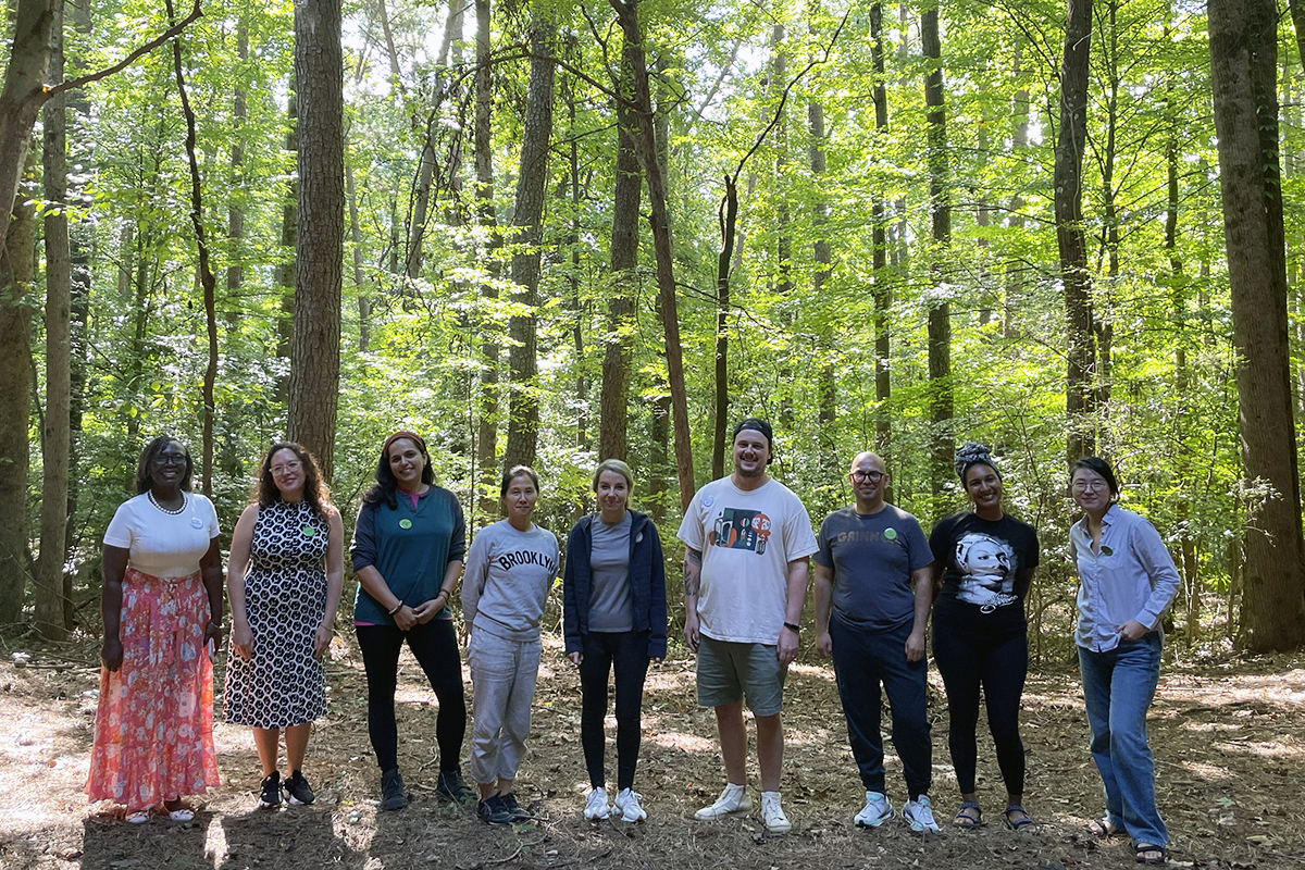 Group of faculty members in the woods