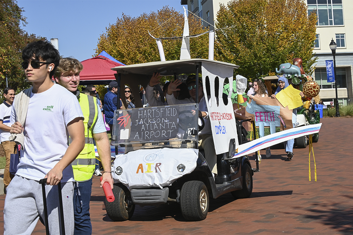 airport themed golf cart in parade