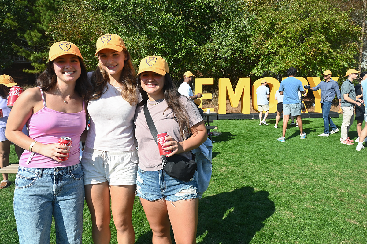 three friends smile together