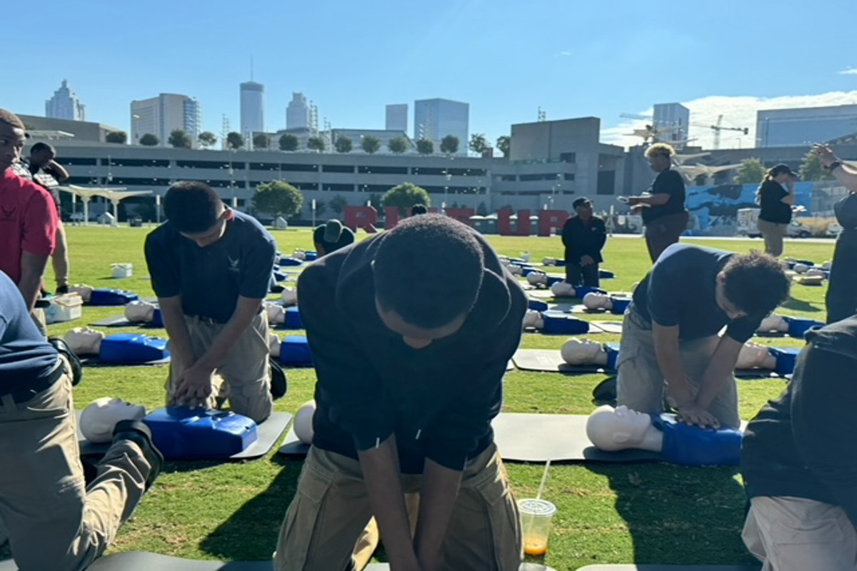 Emory Healthcare teams up with Atlanta Falcons for hands-only CPR and AED training event 