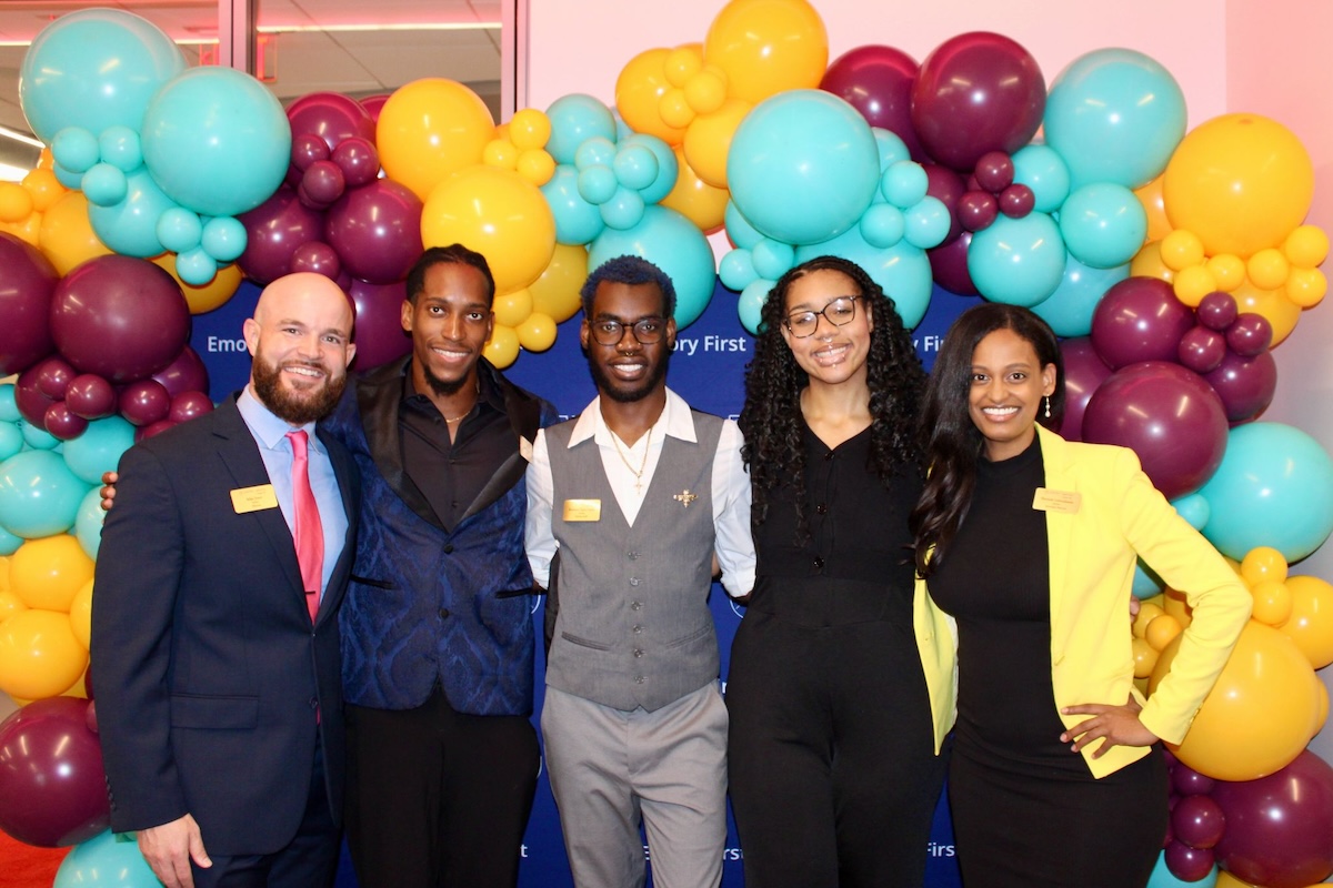 Emory First group with balloon background