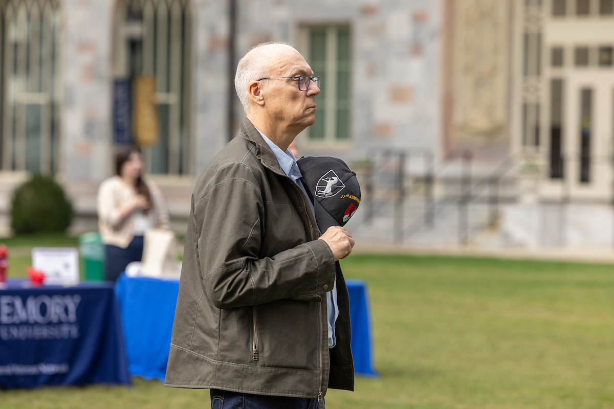 Man holding his hat in hands