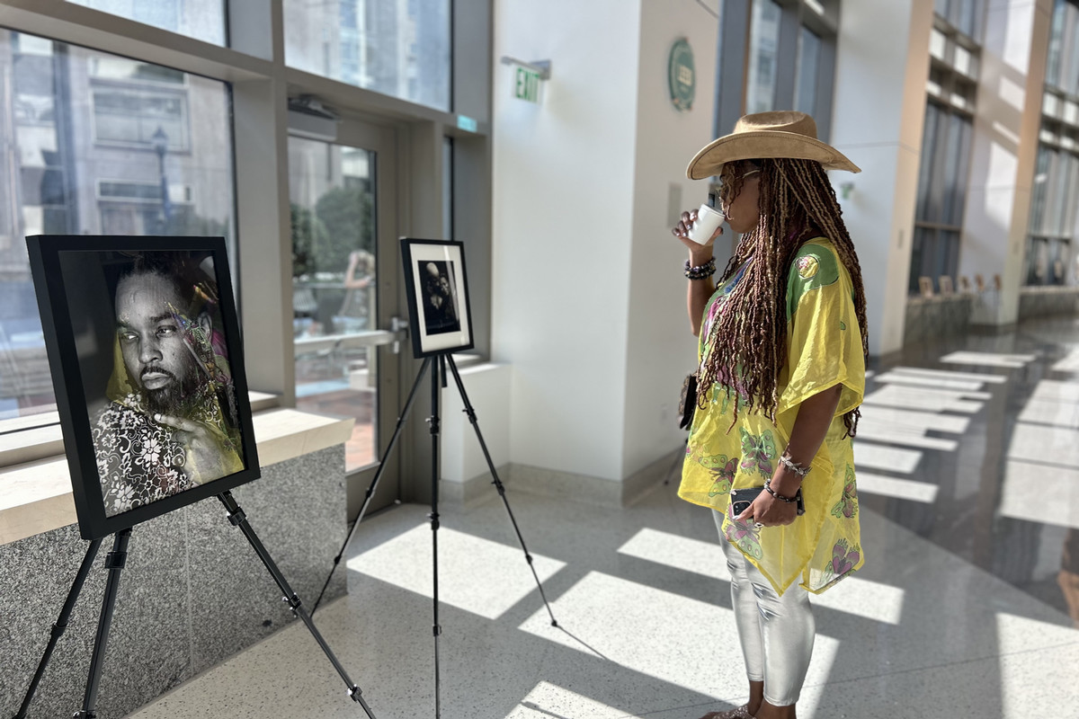 woman looking at photograph