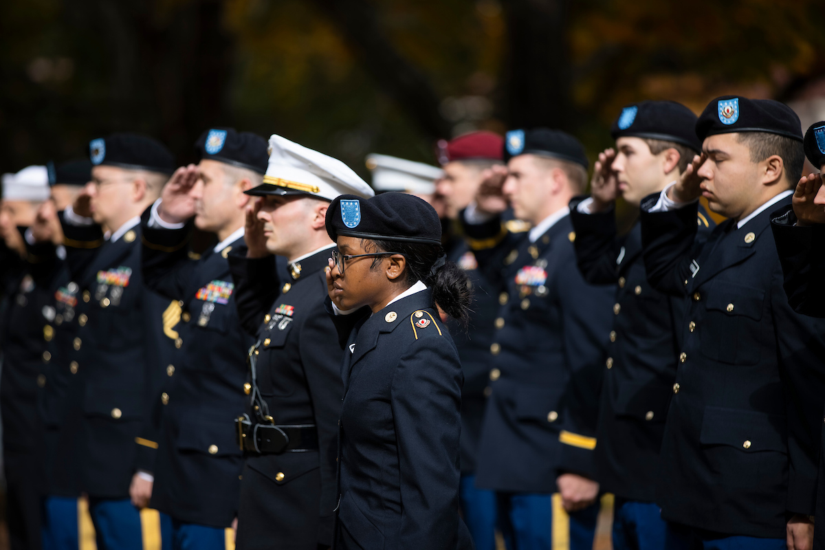 Veterans saluting flag 