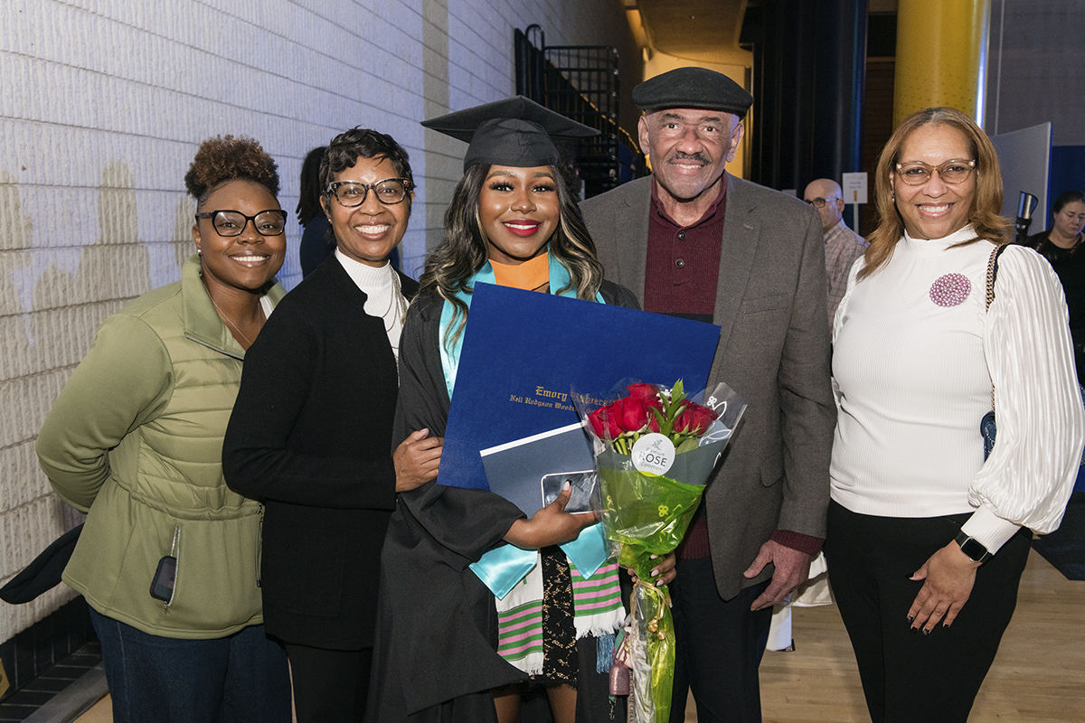 nursing school graduate with family members