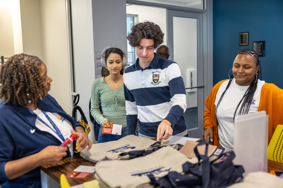 students getting a tote bag