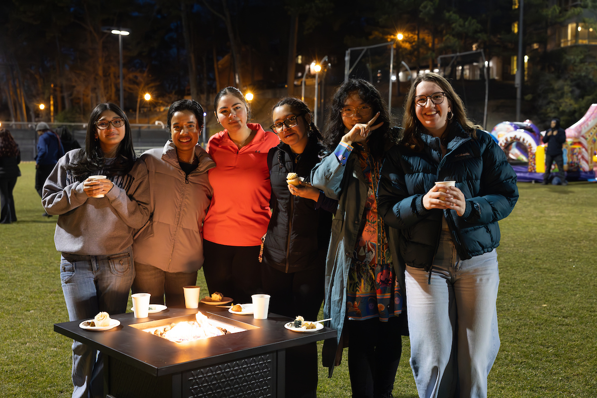 students around fire pit 