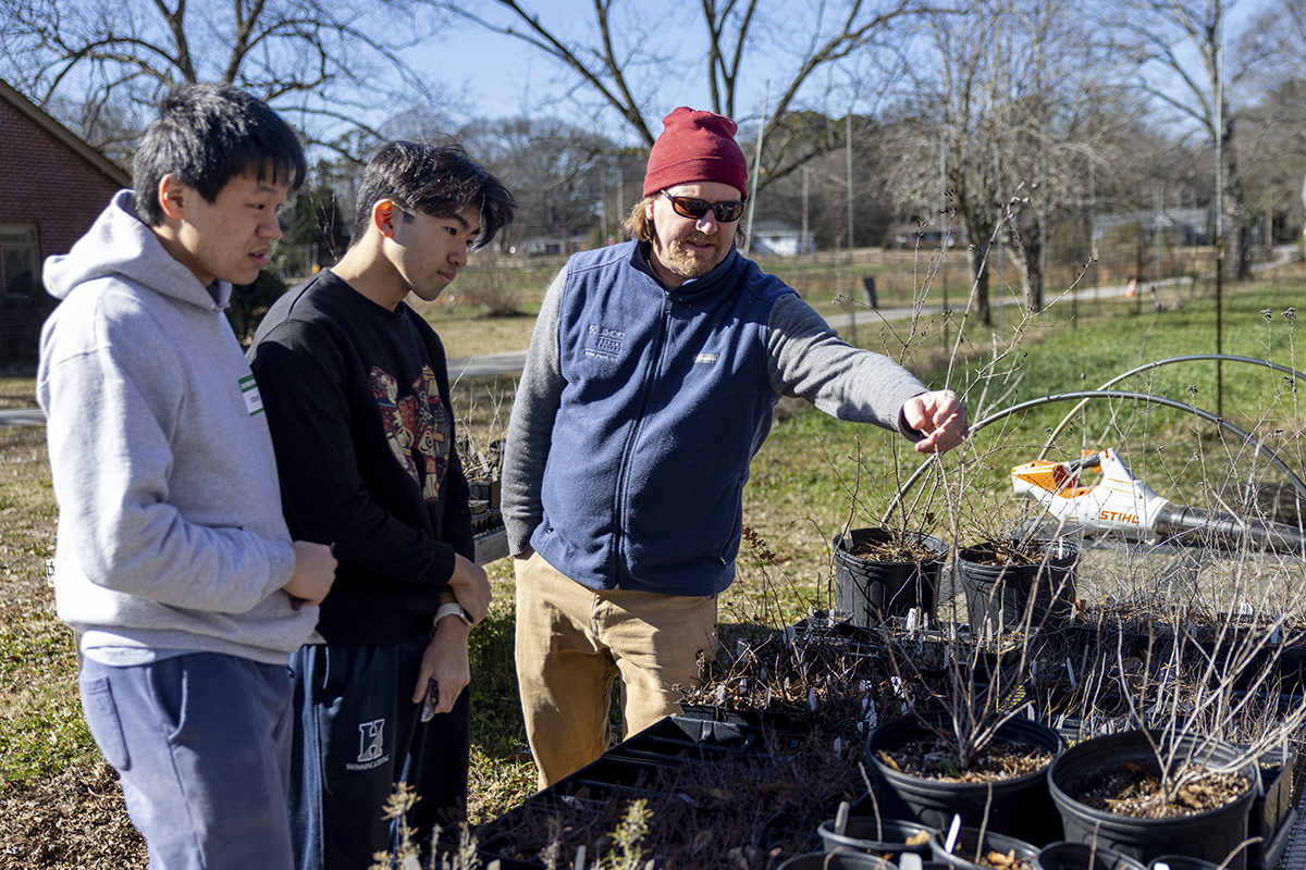 farmer teaching about plants