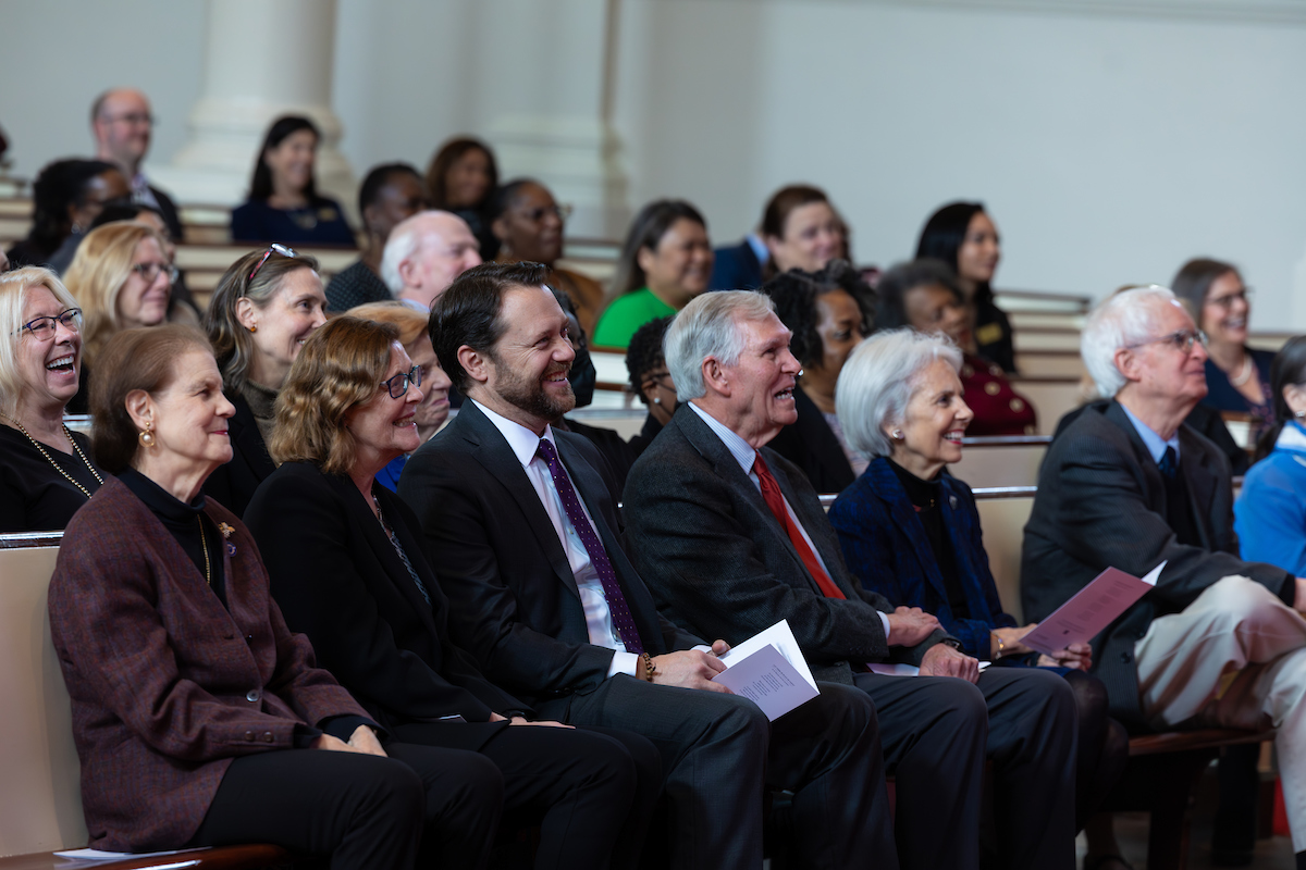 people sitting in a pew 