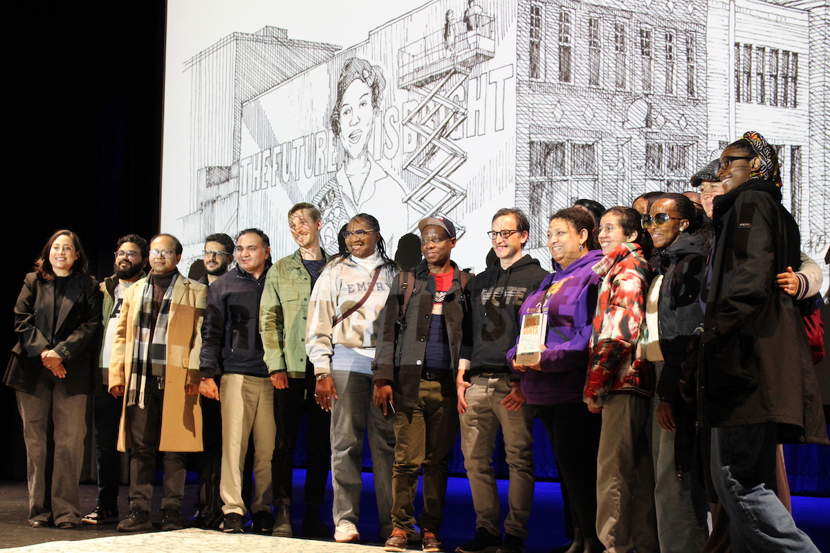 students standing on stage 